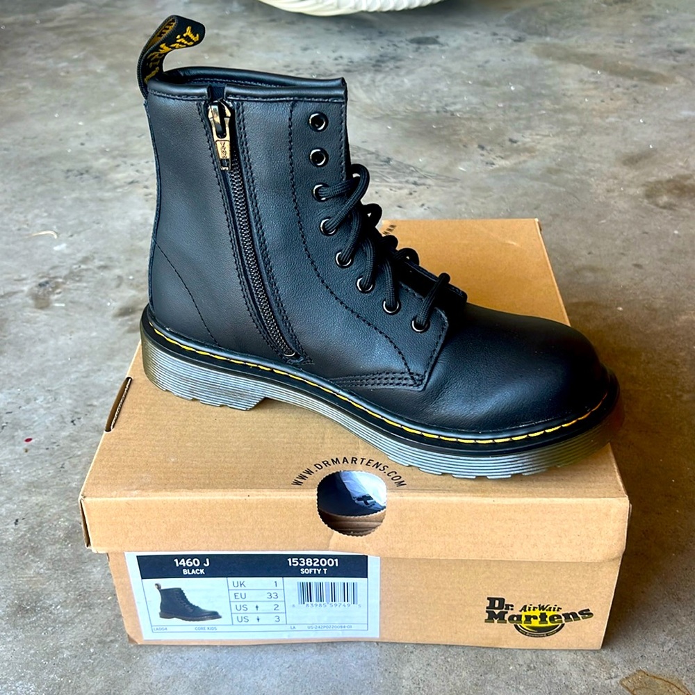 Black kids Dr. Martens, size 2M, size 3W. Never been worn.